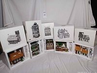 All five Dept 56 Dickens Village boxes with corresponding buildings in styrofoam
