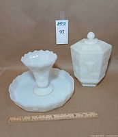 Cake stand and canister side by side with ruler for scale