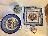 Top view of all four Polish pottery pieces