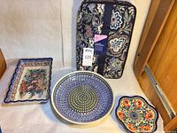 Group shot: three Polish pottery dishes and Vera Bradley carrier