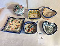 All eight stoneware pieces arranged together