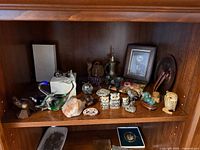 Full view of shelf with all collectibles