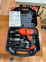 Drill, cord, case, manual overview