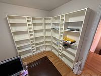 Front view of entire L-shaped Billy bookcase combination