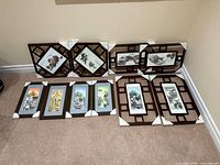 All ten framed prints arranged, showing lattice and solid frame styles