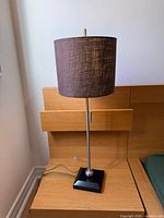 Lamp showing full height, shade, stem, base