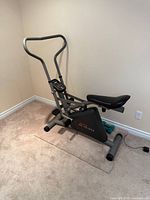Full view of grey Pro-Form R-940 exercise bike in room