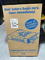 Front of sealed shipping box displaying printed graphics and product information