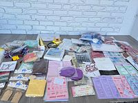 All items laid on table showing variety of unopened party supplies
