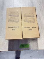 Top view of two sealed WP39 shower caddy boxes
