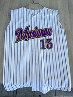 Front view of pinstriped sleeveless baseball jersey showing Marianna logo and number 13