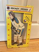 Front view of sealed Sportrophy package showing full figure and packaging graphics