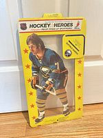 Front view of sealed Hockey Heroes Sportrophy showing full figure and packaging