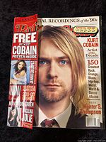 Front cover of Rolling Stone Issue 813 showing Kurt Cobain portrait and free poster banner