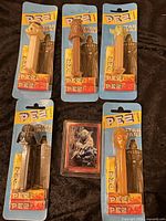 All five sealed PEZ dispensers and Yoda card