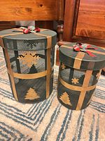 Both metal mesh vessels showing size difference and decorative cutouts