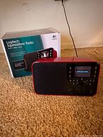 Radio and retail box side by side