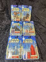 All six sealed Star Wars figures displayed front view