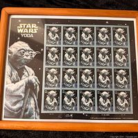 Full view of framed sheet showing 20 Yoda 41¢ stamps in wooden 8×10 frame