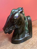 front left view showing horse head form and glaze colors