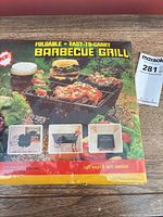 Front of sealed package showing product image and features text