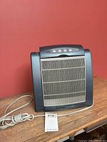 Front view of Heaven Fresh HF280 air purifier with power cord