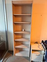 Open-shelf bookcase showing full height and six shelves