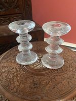 Both Festivo candlestick holders on table