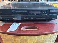 Front view of Sony CDP-C5F showing five-disc carousel tray, controls, labeling and cosmetic wear