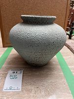 Front view showing vase shape, texture, color