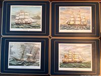 All four placemats showing ship images and borders