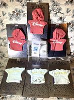 All six nuiMOs Spirit Jersey outfits on backing cards