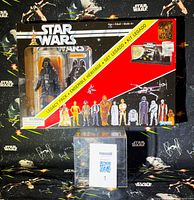 Front view of sealed Star Wars Legacy Pack box with Darth Vader figure visible