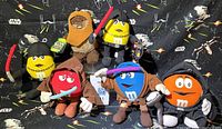 All six Star Wars themed plush toys grouped on Star Wars backdrop