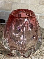 Front view showing lobed pink-to-clear vase body