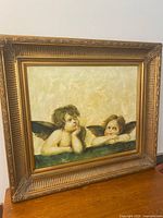 Frontal view showing full painting and ornate frame