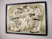 Framed abstract cubist painting on wall