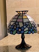 Front view of stained glass candle lamp