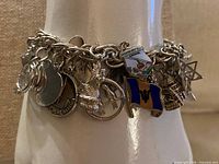 Bracelet on display showing multiple charms