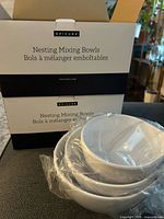 Boxed Epicure Nesting Mixing Bowls with one set of three white bowls in plastic
