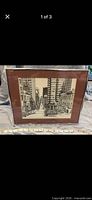 Full view of framed print with measuring tape for scale