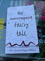 Front cover of signed paperback book