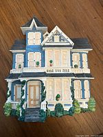Front view of the Victorian house resin plaque