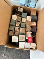 Top view of boxed player piano rolls showing labels and quantity