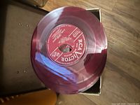 Close-up of red translucent RCA Victor 45 RPM record
