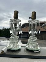Two small crystal table lamps with prisms and brass sockets