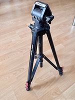 Full view of Ambico tripod standing with legs extended
