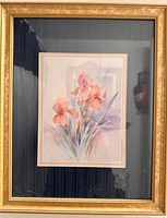Front view of floral watercolor-style print in gold frame