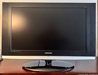 Front view of Samsung LN-83241D television powered off on stand