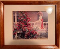 Framed print woman on veranda